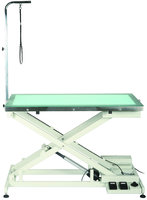 Height adjustable grooming tables