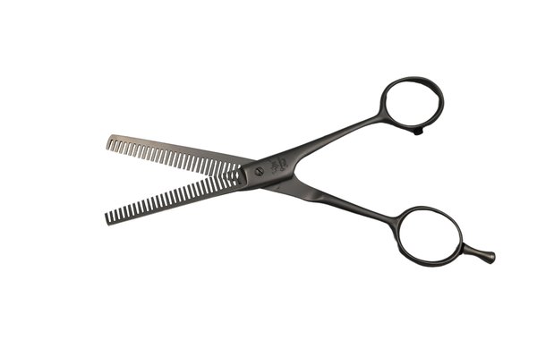 A pair of silver thinner scissors lies slightly open against a white background. Link: Category thinners.